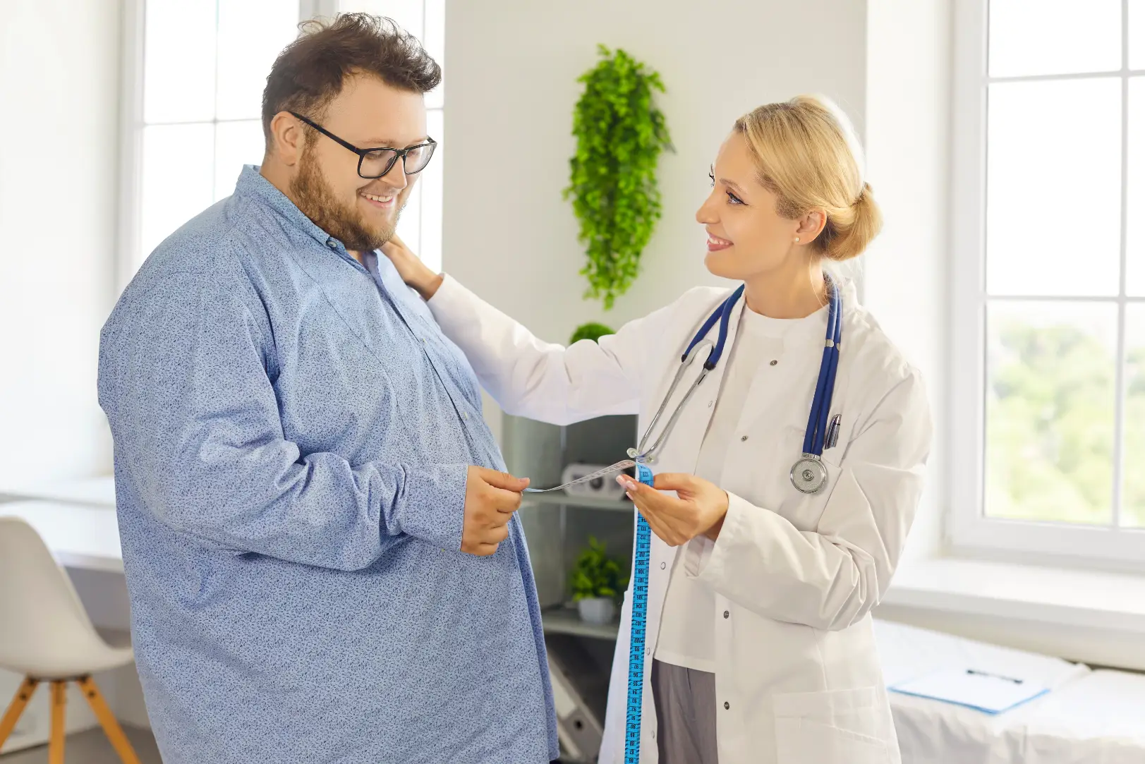 Doctor discussing weight loss plan with an overweight patient in a clinic